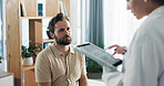 Doctor, man and patient with tablet for healthcare checkup, visit or clinic appointment at hospital. Male person, medical worker or exam with technology for health results or diagnosis at clinic