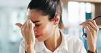 Woman, headache and administrator with glasses in stress for eye strain or mistake at office. Tired, female person or employee with migraine or pressure for wrong optometry prescription at workplace