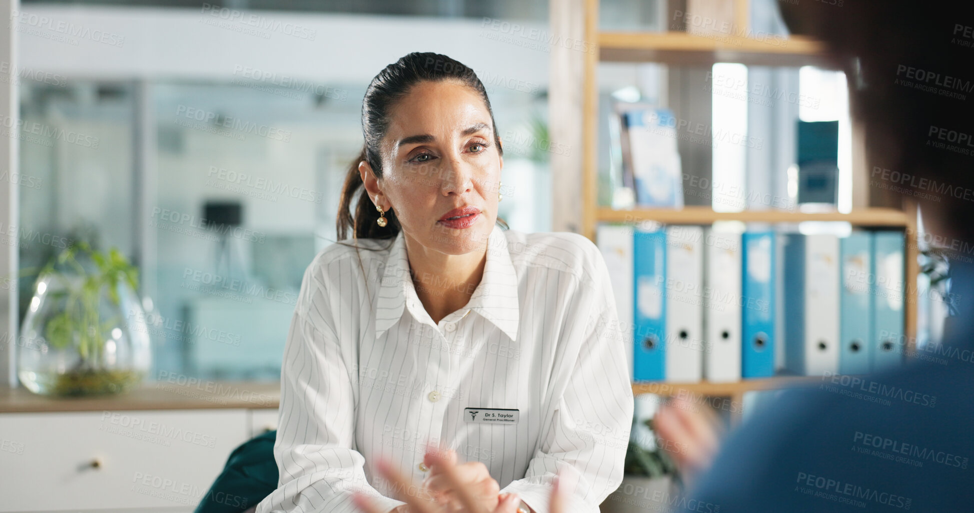 Buy stock photo Doctor, patient and listening in office for consultation, healthcare and medical help at clinic. Woman, communication and consulting for diagnosis, advice or feedback with wellness professional