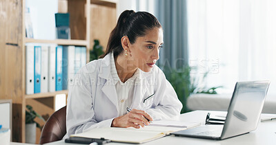 Buy stock photo Laptop, doctor or woman with research notes for medical website, report or administration in clinic. Paperwork, reading or writing online assessment in notebook with healthcare professional in office
