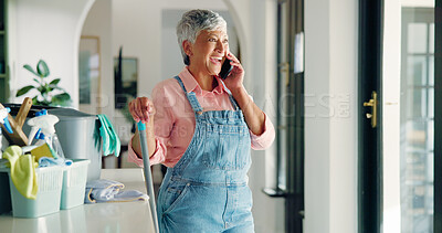 Buy stock photo Senior, happy woman and cleaning with phone call for housekeeping or domestic service at home. Female person, maid and cleaner talking with smile on mobile smartphone for hygiene solution at house