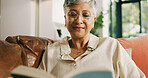 Relax, old woman and reading a book in home for cognition, literature story and retirement hobby. Reader, senior person and best seller novel on sofa for fantasy fiction, knowledge and weekend break