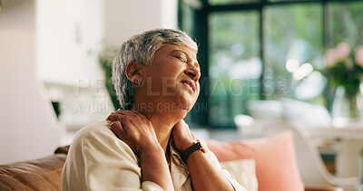 Buy stock photo Neck pain, tension and senior woman on sofa in home with fibromyalgia, tired and stiff joints. Elderly, stress and massaging frozen shoulder for arthritis, ache or pinched nerve problem in retirement