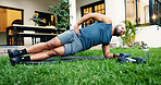Outdoor, stretching and man with fitness, side plank and warm up with wellness, home and energy. Exercise, person and athlete with training, healthy and calm with body workout morning and backyard