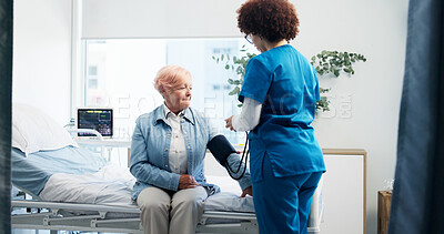 Buy stock photo Nurse, old woman and blood pressure test in hospital for hypertension, healthcare checkup and exam. Appointment, people or monitor heart wellness of senior patient for cardiovascular health in clinic