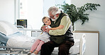 Hug, healthcare and grandfather with child in hospital for support, pediatric patient and love. Medical, empathy and icu recovery with senior person and kid in clinic bed for family comfort and trust