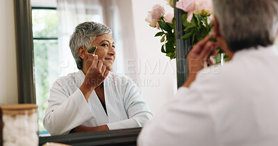 Buy stock photo Woman, skincare and mirror in home with jade roller, facial massage and anti aging in bedroom. Mature person, stone tool or smile in reflection for skin treatment, dermatology or care at vanity