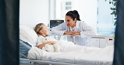 Buy stock photo Healthcare, doctor and kid in bed for recovery, treatment update and teddy bear for comfort. Girl patient, pediatrician and smile in hospital for successful surgery, medical support and plushie