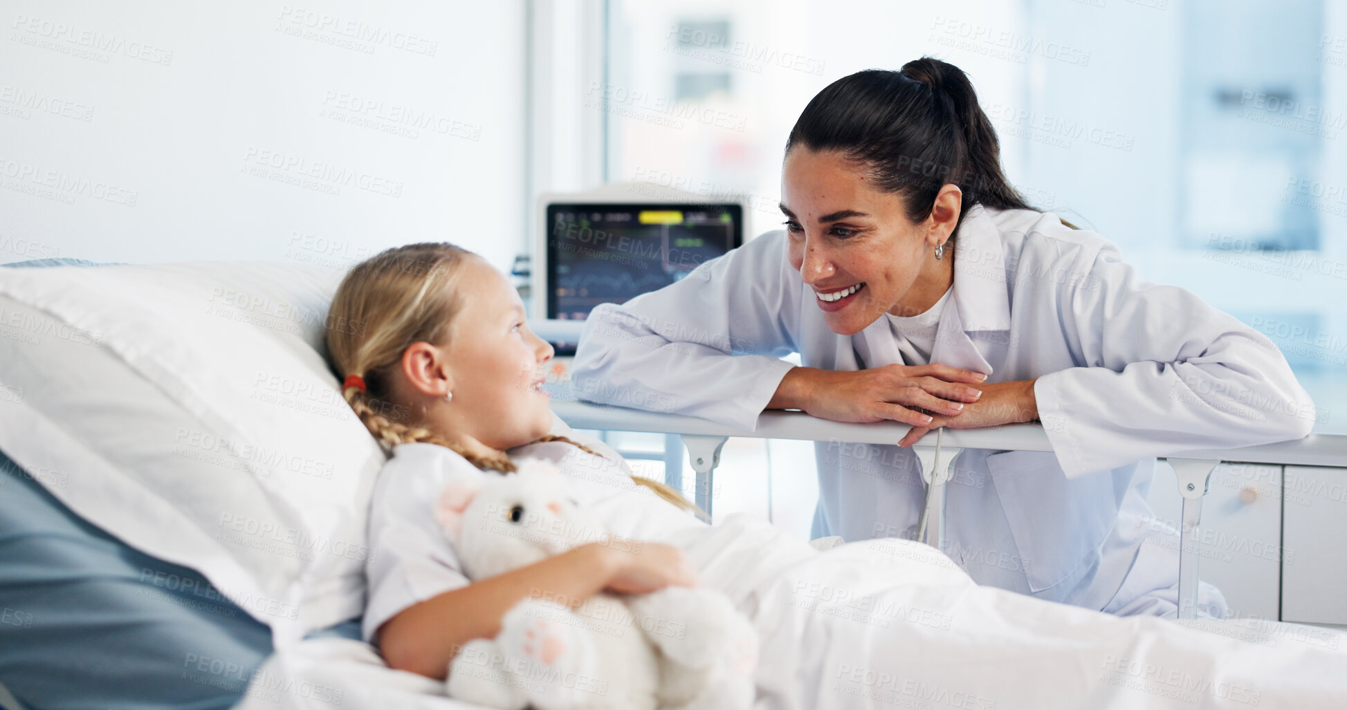 Buy stock photo Healthcare, doctor and child in bed for recovery, treatment update and teddy bear for comfort. Girl patient, pediatrician and happy in hospital for successful surgery, medical support and plushie