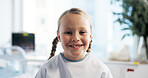 Girl, child and smile in portrait at hospital for recovery, treatment or pediatric wellness on bed. Kid, face and patient with illness, happy and rehabilitation with healthcare at clinic in France