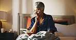 Reading, smile and book with old woman in bed for knowledge, literature and self help study. Mindfulness novel, learning and retirement with senior person in bedroom of home for information and rest