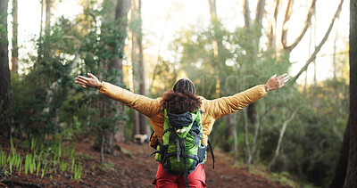 Buy stock photo Woman, open arms and back with success for hiking, achievement and goals on adventure in forest. Person, celebration and outdoor with bag in woods for winning, target and freedom on trail in Nigeria