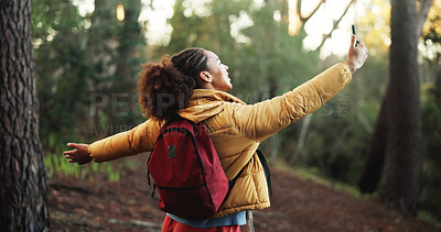 Buy stock photo Selfie, hiker and woman in woods, trip and memory of vacation on social media, backpacking and post. Outdoor, photography and influencer on adventure in forest, person and profile picture on holiday