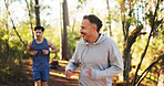 Marathon, man and smile in forest for fitness, workout and endurance for health and wellness. Cardio club, running group and jog together for competition, practice and team exercise for pace training