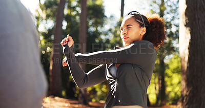 Buy stock photo Woman, fitness and stretching with arms in forest for workout preparation or physical activity. Female person, runner or getting ready in warm up for outdoor exercise, hiking or trekking in nature