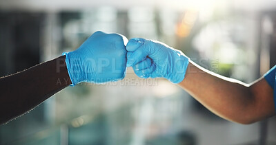 Buy stock photo Teamwork, fist bump and hands of doctors in hospital for healthcare, support and surgery success. Medical achievement, treatment victory and partner with closeup of people in clinic for agreement