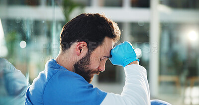 Buy stock photo Sad, stress and thinking with doctor in hospital for medical burnout, tired and fatigue from clinic shift. Healthcare, reflection and overtime crisis with frustrated person on floor for doubt