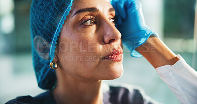 Sad, doctor and woman in hospital thinking for surgery mistake, operation failure and medical crisis. Healthcare, surgeon and face of person with guilt, stress and upset for patient loss in clinic
