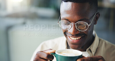 Buy stock photo Happy, coffee and black man in office with break, calm or peaceful reading for creative research. Smile, glasses and African male editor with cappuccino in morning with publishing at agency.