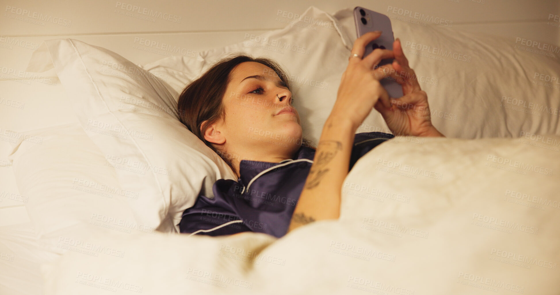 Buy stock photo Woman, bed and relax with smartphone for communication, text or online chat. Typing, connection and female person in bedroom for social media post, update or comment on mobile app at night in home