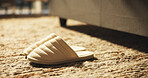 Plush slippers, home and bedroom floor for fashion, morning and comfortable footwear on rug. House, closeup and shoes on carpet by bedside with interior of apartment, empty room and soft accessory