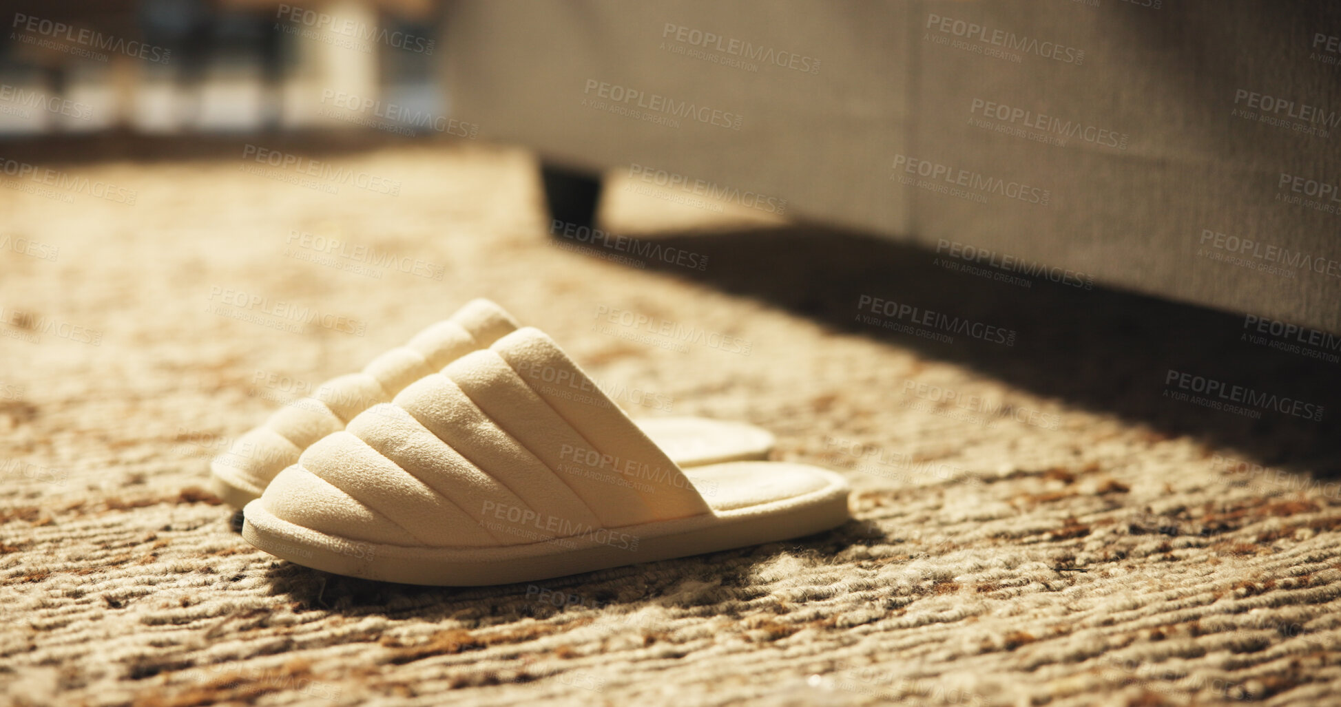 Buy stock photo Plush slippers, home and bedroom floor for fashion, morning and comfortable footwear on rug. House, closeup and shoes on carpet by bedside with interior of apartment, empty room and soft accessory