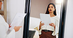 Practice, speech and woman in mirror in home for public speaking, presentation and monologue. Talking, reflection and person with paperwork, documents and reading for oral, proposal and lecture