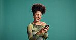 Phone, smile and portrait of woman in studio for social media, message or fashion blog. Mobile, online chat and happy African model on app for news, trendy article and mockup space on background