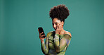 Surprise, cellphone and woman in studio, wow and announcement on green background. Person, mobile user and smartphone with facial expression, space and shocked with emoji, gossip and notification