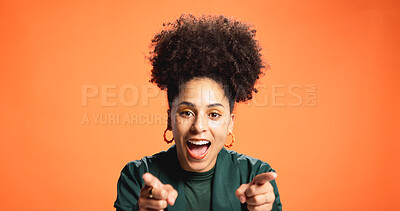 Buy stock photo Portrait, excited and woman pointing at you in studio for decision, choice or promotion. Happy African person, gesture and pick option, selection or winner with opportunity on orange background space