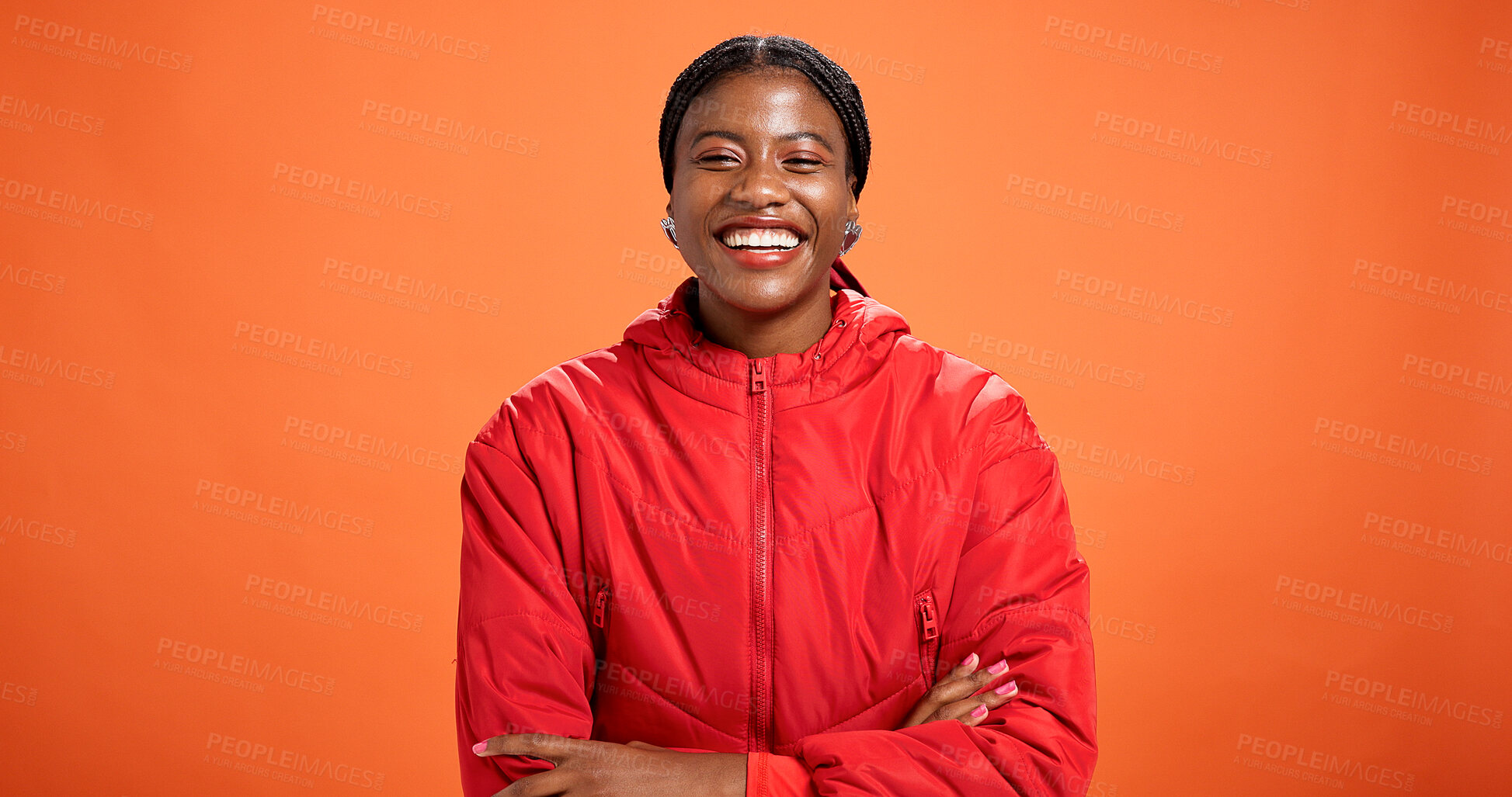 Buy stock photo Fashion, confidence and portrait of black woman in studio with trendy clothes, outfit and winter style. Crossed arms, mockup space and person with cool jacket, pride and smile on orange background