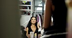 Woman, model or makeup artist in mirror for beauty, touch up or preparation for production. Behind the scenes, people or smile in backstage reflection with blush, fashion or cosmetics in media agency
