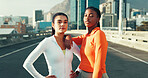 Serious, women and athletes in city for fitness, running or workout together on bridge. Confident, sports and portrait of female people with bonding for cardio exercise or training in urban town.