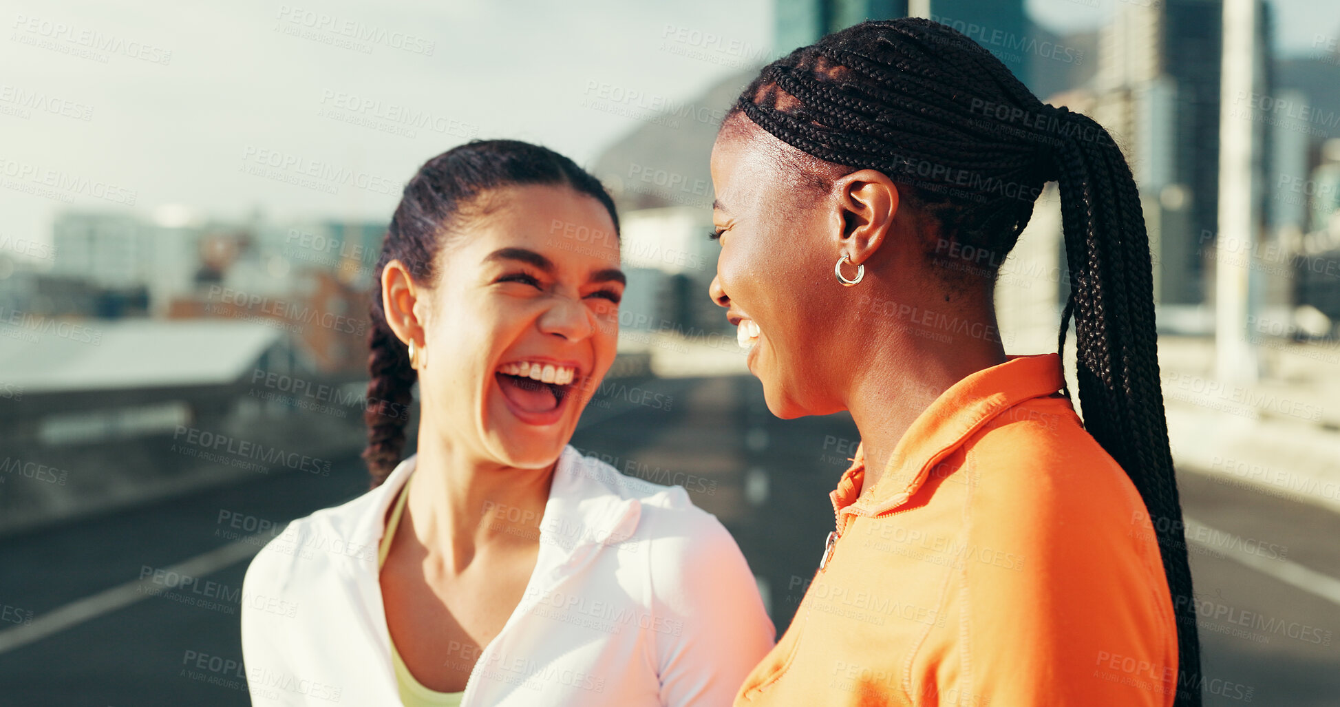 Buy stock photo Friends, happy and women in city for fitness, running and workout for marathon training. Sports, laughing and people in urban town with funny joke after exercise, performance and active in morning