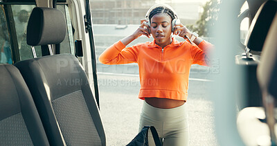 Buy stock photo Runner, start and car with black woman and headphones for fitness playlist, health and audio. Marathon, workout podcast and streaming with person and vehicle for training songs, sports and sound