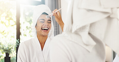 Buy stock photo Laugh, brush and makeup with woman and mirror for foundation application, beauty and tools. Facial, smile and cosmetics with reflection of person in bathroom of home for glow, product and blush 