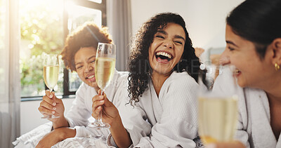 Buy stock photo Women, friends and happy at spa with champagne, laugh or funny joke on vacation at luxury resort. People, girl and relax with group for drink, alcohol or bonding at reunion, hotel or lodge on holiday