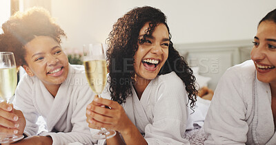 Buy stock photo Women, friends and laugh at spa with champagne, happy or funny joke on vacation at luxury resort. People, girl and relax with group for drink, alcohol or bonding at reunion, hotel or lodge on holiday