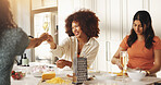Girl, friends and cooking with toast, wine glass and happy with bonding, love and reunion in home. Women, champagne and smile with celebration, ingredients and food with alcohol in kitchen at house