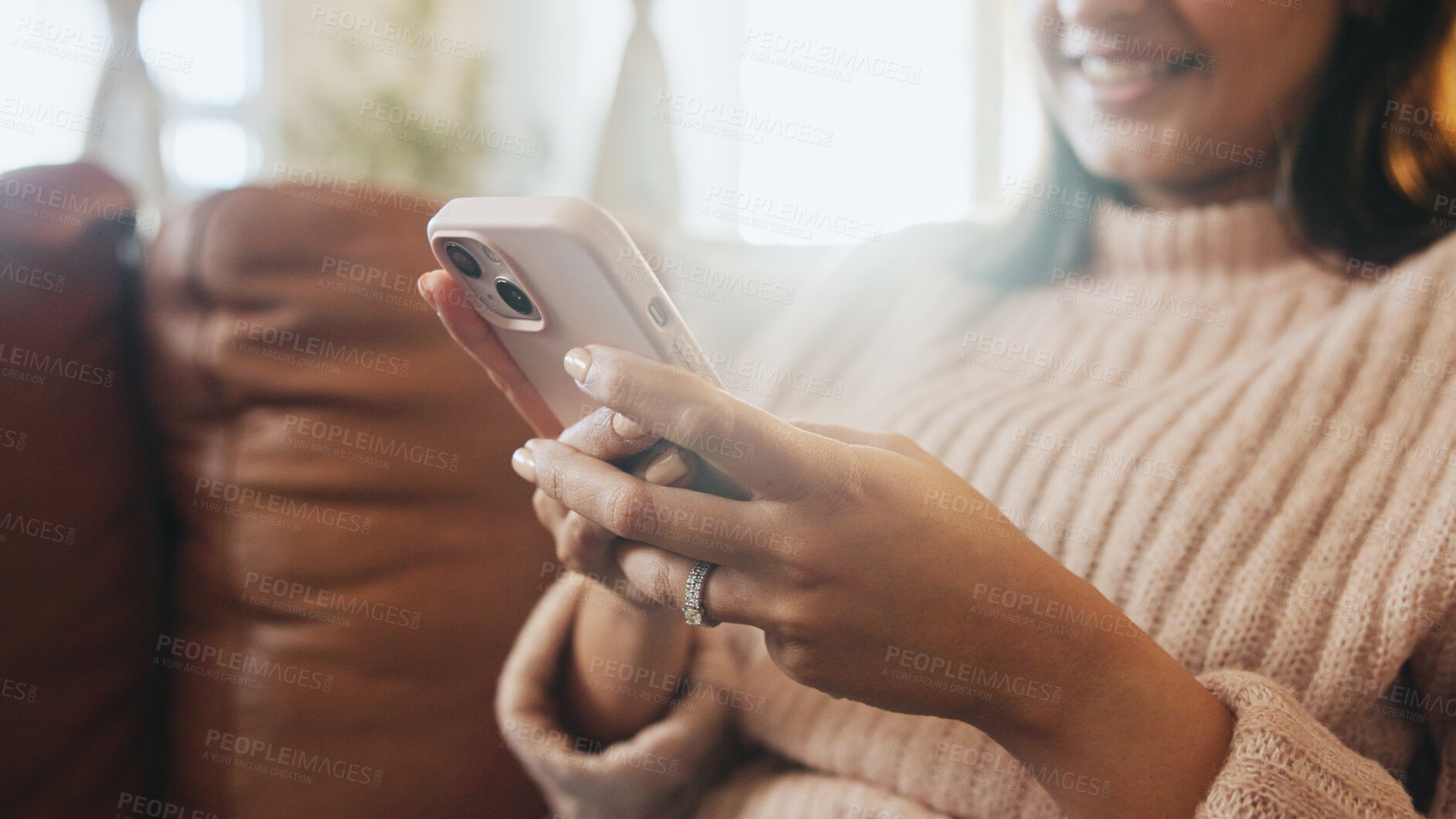 Buy stock photo Home, hands and woman with smartphone, relax or playing video game in living room, happy and website. House, gamer and person with mobile app for entertainment, smile and chilling in lounge with tech