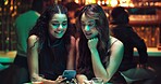 Phone, online dating and search with friends in nightclub for relationship app, communication and party. Culture, meeting and social media with people at bar for conversation, network and contact