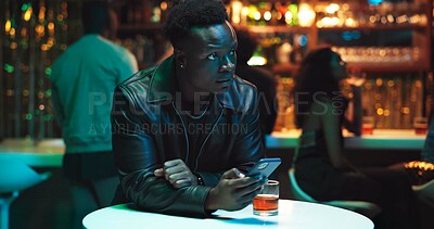 Buy stock photo Phone, online dating and waiting with man in nightclub for relationship app, communication and party. Culture, meeting and social media with person at bar for disappointed, partner search and contact