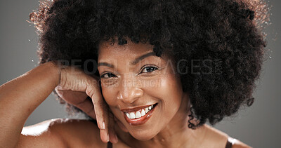 Buy stock photo Smile, beauty and portrait of black woman in studio with natural hair, wellness and cosmetics. Happy, salon and face of person with afro hairstyle for texture, growth and shine on gray background