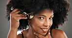 Woman, skincare and jade roller in studio with facial routine, beauty and anti aging by background. African person, portrait and tools with massage, circulation and product for results in Nigeria