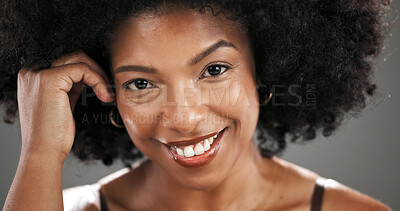Buy stock photo Haircare, portrait and woman with afro in studio with healthy texture, growth results and volume. Beauty glow, african person and happy with hairstyle on gray background for self care and maintenance