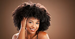 Hair, happy and portrait of black woman in studio for health, texture and growth on brown background. Salon, mockup space and person with natural hairstyle, afro and beauty for wellness and grooming