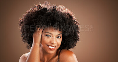 Buy stock photo Hair, happy and portrait of black woman in studio for health, texture and growth on brown background. Salon, mockup space and person with natural hairstyle, afro and beauty for wellness and grooming