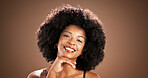 Hair, happy and portrait of African woman in studio for health, texture or growth on brown background. Salon, mockup space and person with natural hairstyle, afro and beauty for wellness and grooming