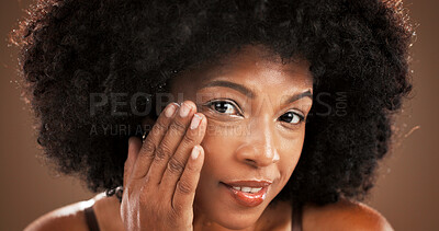 Buy stock photo Beauty, facial and portrait with black woman in studio for antiaging or moisturizing routine. Face, lotion and skincare with African model on wall background for cosmetics, dermatology or wellness