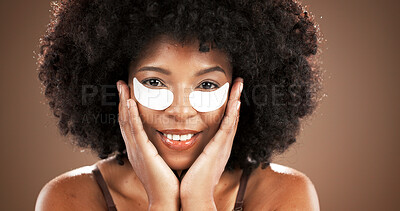 Buy stock photo Beauty, eye mask and portrait of black woman on brown background for facial, dark circles and wellness. Dermatology, collagen and face of person for skincare, anti aging and cosmetics for health